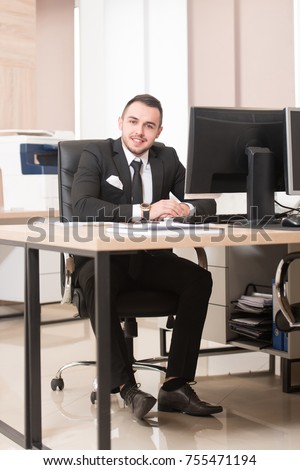 Portrait Of A Handsome Casual Businessman Smiling