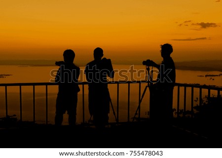 photographer waiting for shoot sunset 