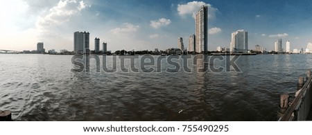 Bangkok City Riverside With High Building And Condominium , Panorama Picture. Selective Focus. Image For Templates, Placards, Banners, Presentations, Reports, Card And Wallpaper. etc