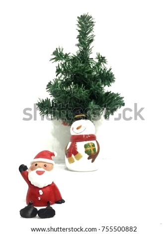 Santa Claus sitting cheerfully next to a green slate and Snowman standing under a Christmas tree on white background.