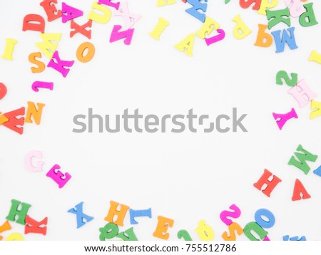 Frame Made from Colorful Letters on White Background