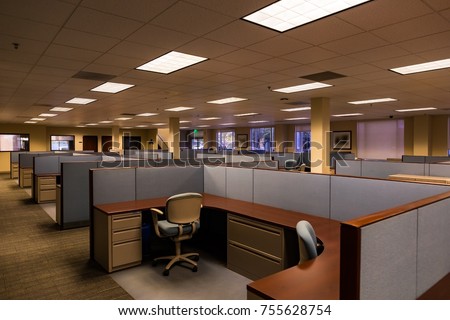 An empty office space with furnished cubicles ready to be occupied. Royalty-Free Stock Photo #755628754