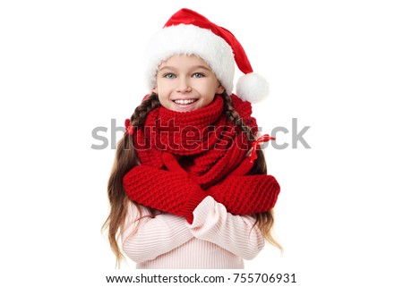Young girl in santa hat with scarf and gloves on white background