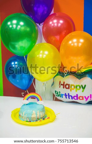 cake and balloons at the birthday party