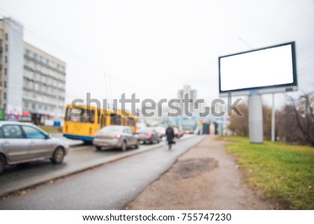Blank Billboard on the street under pavement near road with cars