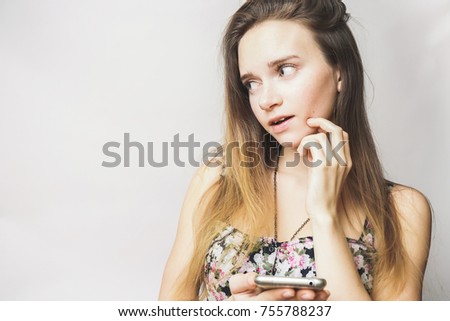 summer young teen girl with mobile phone looking something,text