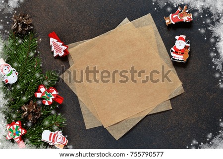 New Year card. Letter for Santa. Christmas tree and decorative clothespins on a brown background with space under the text.