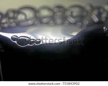 illustrated abstract black and white bubbles in morning sunshine as background