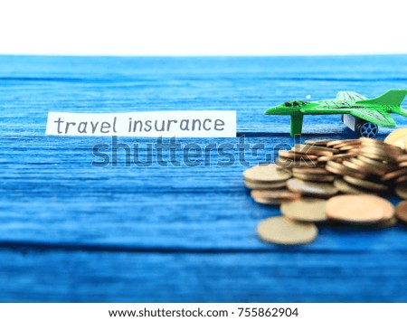 travel insurance and business finance concept on wood background and with tag.