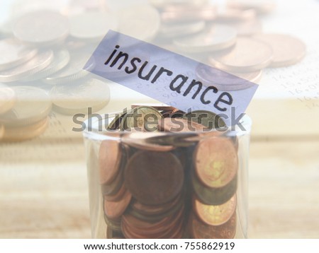 insurance and business finance concept on wood background and with tag.