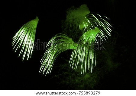 Beautiful fire works with splash of green color