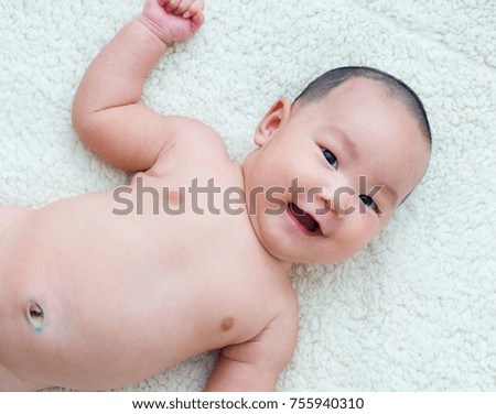 happy newborn on a white background