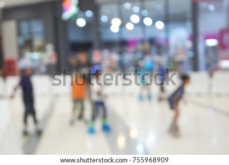 blur photo children learning to roller skate