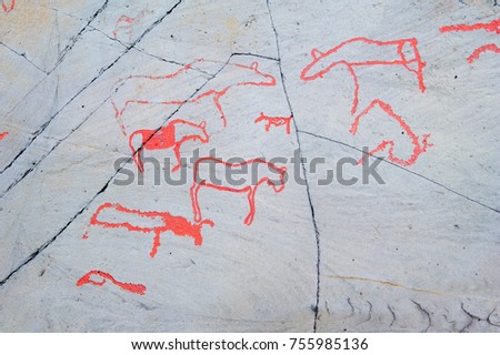 the rock carvings at Alta depicting a herd of elk or reindeers