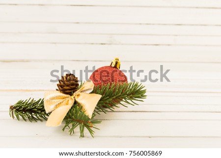 Simple Christmas or winter holidays decoration on white wood table with copyspace
