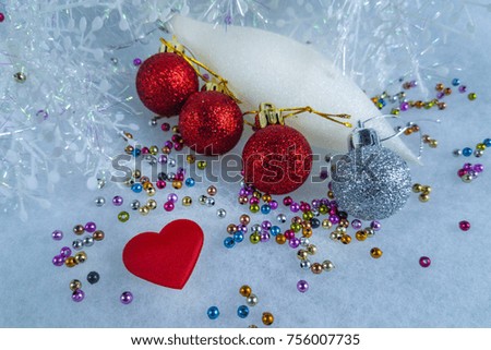 Toys for the Christmas tree and a red heart with beads