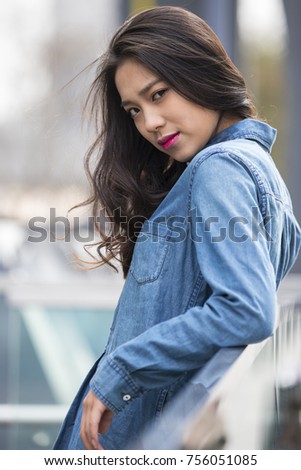 Picture of One beautiful young Chinese woman outdoor in the street