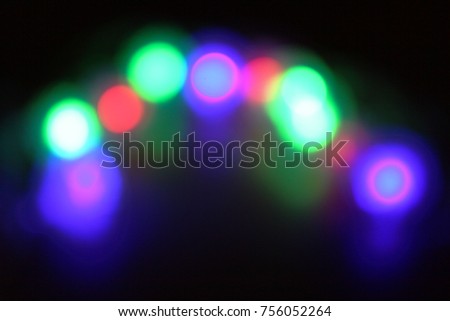 Background of defocused bokeh lights different colors