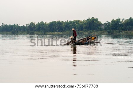 Fishermen in the river
