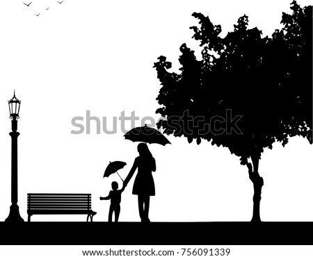Mother walking with her child in park with umbrellas, one in the series of similar images silhouette