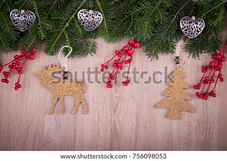 Christmas ornaments with holly, pine tree and hearts