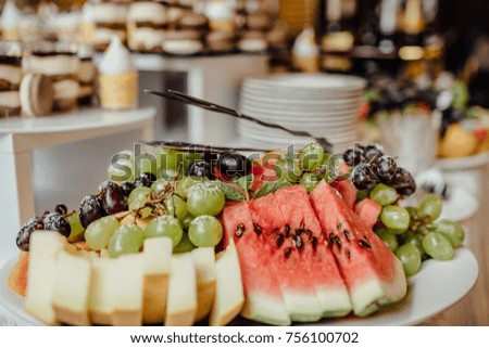 Watermelon with sweet desserts  on the table