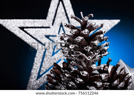Christmas composition of Christmas tree toys on a blue background.