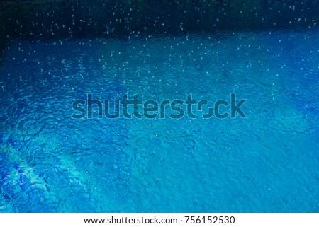 texture background blue pool in the rain