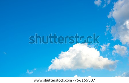 Azure or Sky blue and ocean sky and clouds background. Top image is beautiful sky with colors ocean. Bottom of photo is beautiful bright white clouds. This is the background for making the text above.