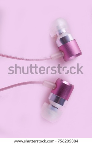 headphones on a pink background