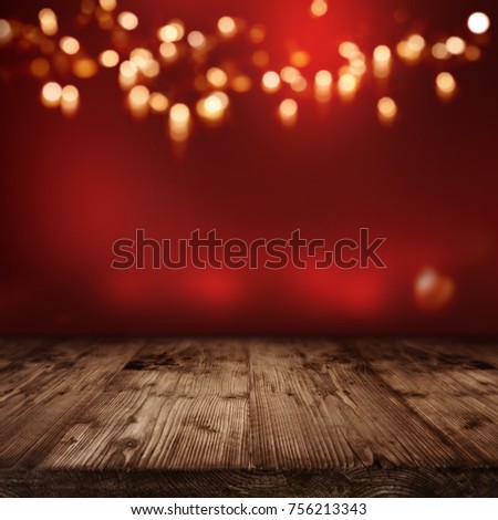 Red illuminated scenery with golden bokeh for a festive presentation