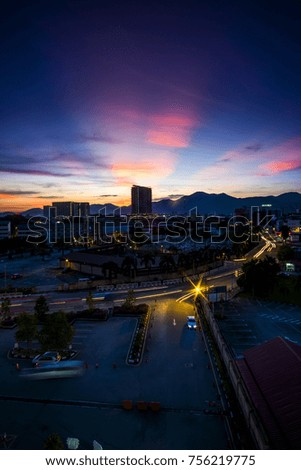 aerial view of Ipoh,Perak,Malaysia with beautiful sunset. Soft focus,motion blur due to long exposure