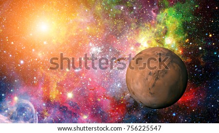 Planet Mars in the solar system. Elements of this image are furnished by NASA