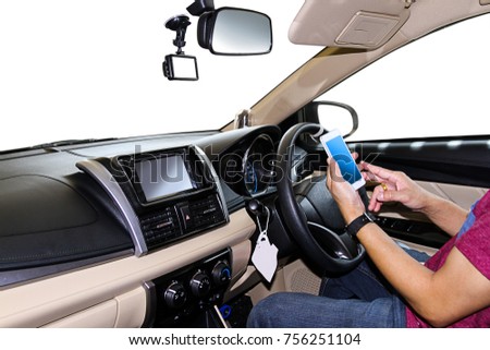 A man using a smart-phone in a car on white background with clipping path.