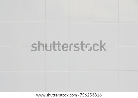 White tile background. Close up texture of wall. construction material