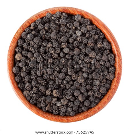 A bowl of black pepper isolated on white background