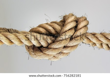 Rope knot. Concept for trust, faith, strength or stress. Royalty-Free Stock Photo #756282181