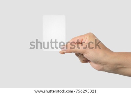 Mockup of female hand holding a Business Card isolated on light grey background. Rounded corner, size 85 × 55 mm.
