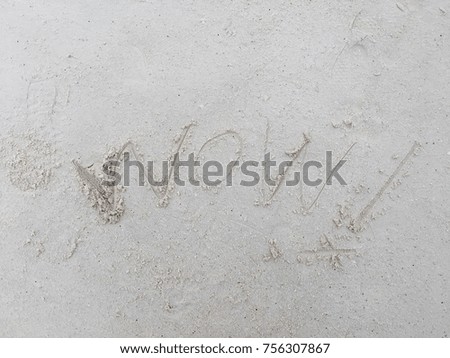 Wow handwriting on beach - vacation concept background