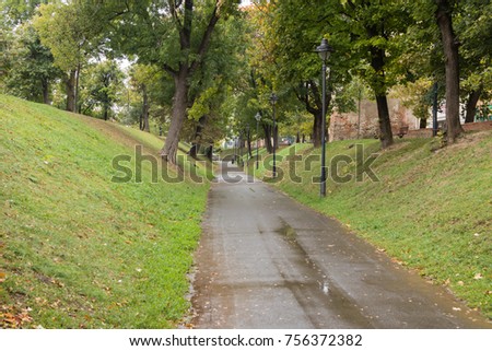 A promenade near the city fortress walls in a rainy day. Sibiu city in Romania