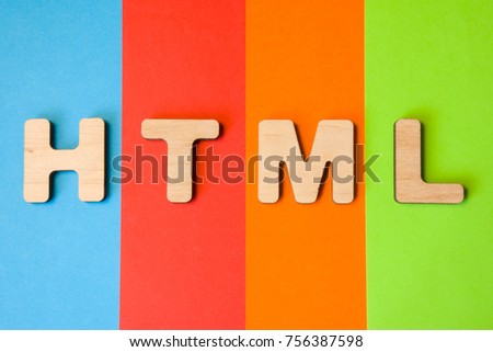 Word or abbreviation HTML, meaning HyperText Markup Language as internet programming language, is on background of four colors: blue, red, orange and green. HTML symbol as  programming language