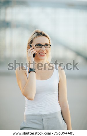 Portrait of stylish business lady in glasses