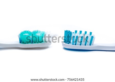 Used old and new toothbrush isolated on a white background
