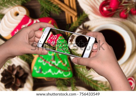 Photo of Christmas gingerbread and coffee for the histogram, advertising or social media. Christmas Food decor on wooden background