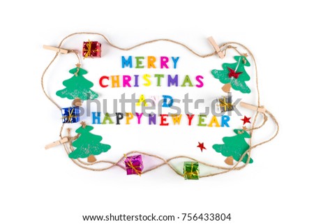 "Merry Christmas and Happy New Year" written with small, colorful, wooden letters and tiny gifts on the pure white background