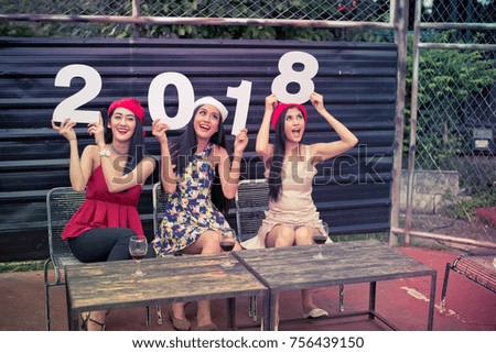 Young people are celebrating New Year's party.