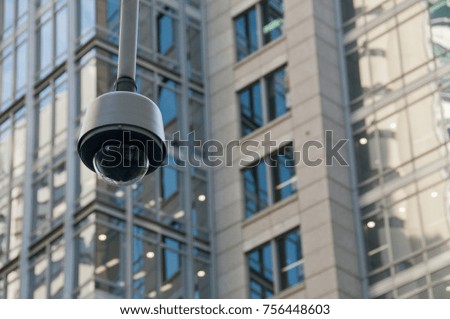 CCTV surveillance security dome camera in city center