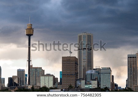 Sydney CBD cityscape with dramatic sky on the background. Sydney, Australia