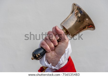 Chester, Cheshire / England - November, 16 2017: The Town Crier of City of Chester, holding his bell and shouting the news. Check my profile for similar images. Royalty-Free Stock Photo #756535483