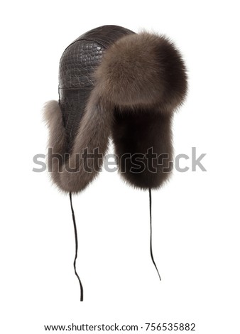 Beautiful, luxurious, expensive hat earflaps made of crocodile leather with fur, isolated on a white background, clipping